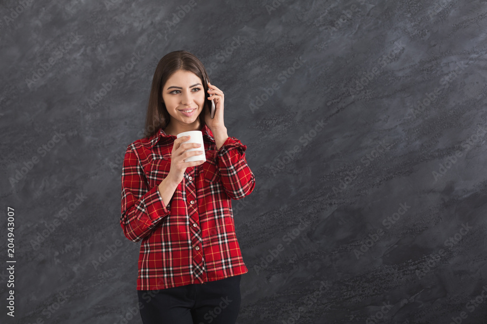 Happy young caucasian woman talking on mobile phone Happy young caucasian woman talking on mobile phone