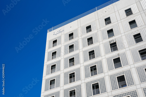 Modern Public City Library - STUTTGART, GERMANY - White interior with many white staircases. Beautiful mordern architecture.