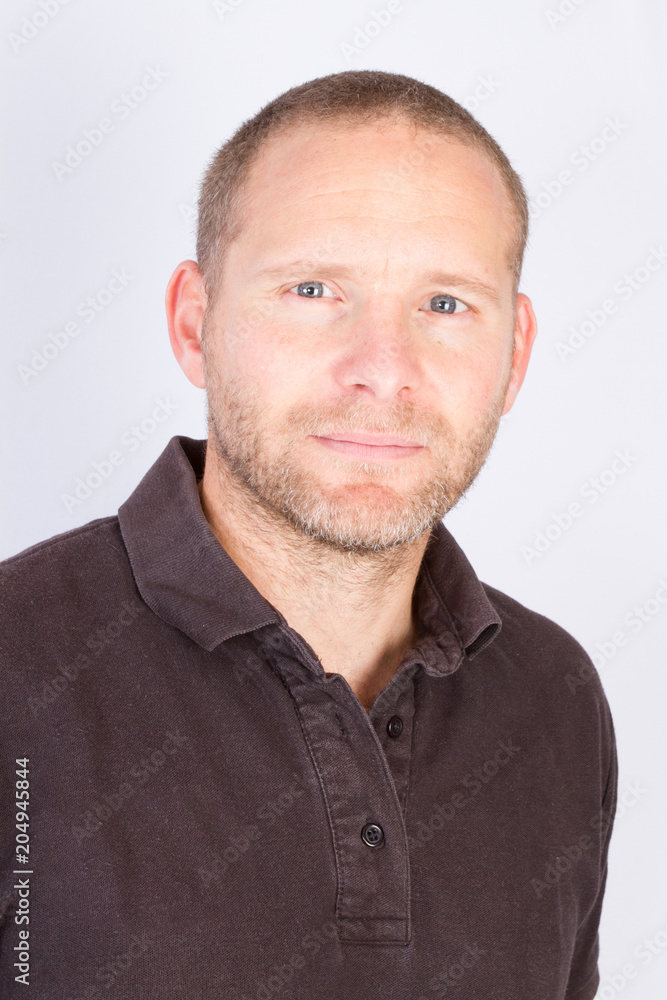 handsome serious man with short hairs and beard handsome serious man with short hairs and beard