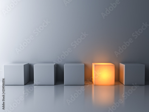 Stand out from the crowd and think different concepts , One glowing box or cube standing among white dim cubes on dark white background with reflections and shadows . 3D rendering.