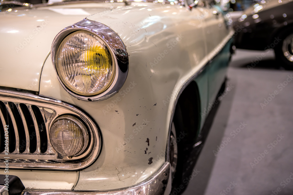 Close-up photo of retro car headlights