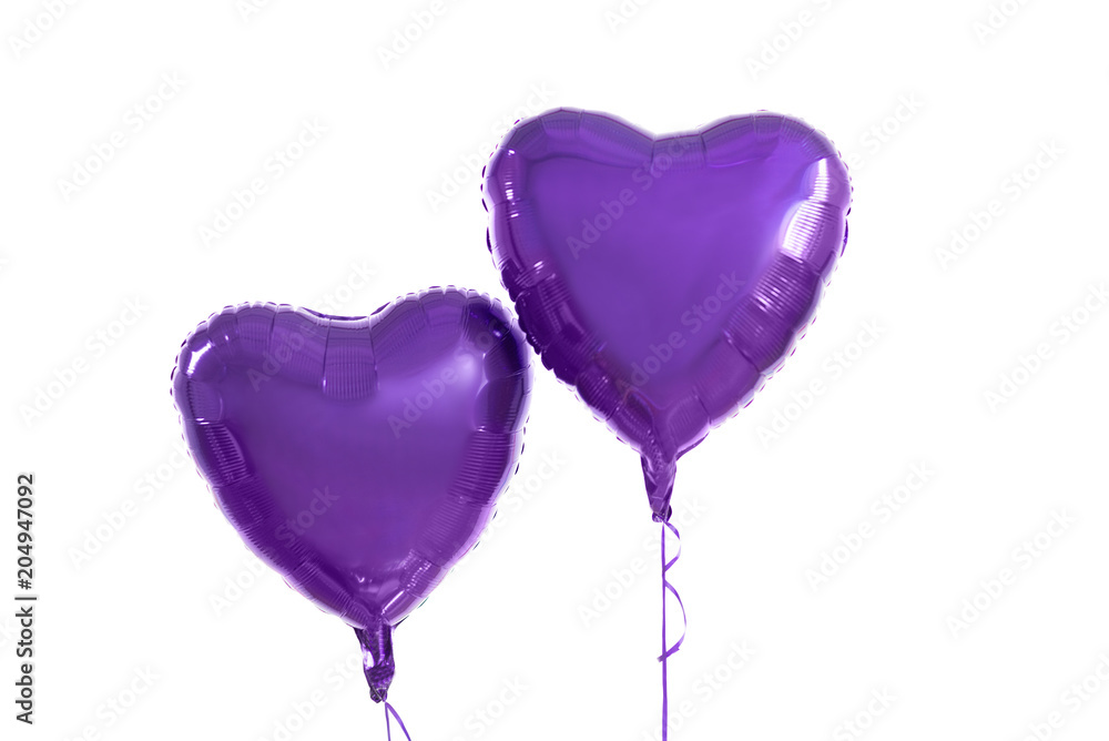 holidays, valentines day and party decoration concept - close up of inflated helium heart shaped balloons over white background