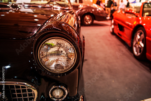 Close-up photo of retro car headlights