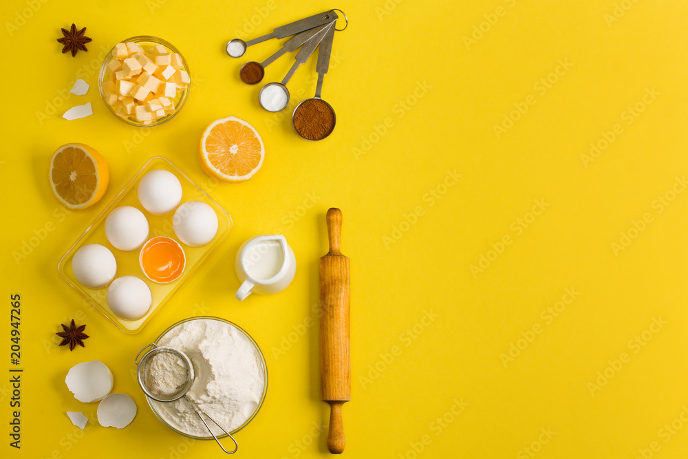 Baking flat lay background with eggs floor butter lemon sieve Baking flat lay background with eggs floor butter lemon sieve