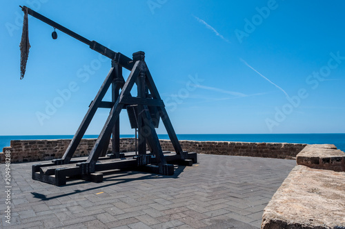 ancient catapult on the ramparts of Alghero photo