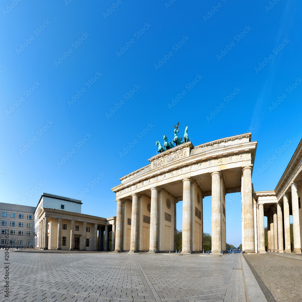 Brandenburg Gate (Brandenburger Tor) in Berlin, Germany, on a bright day, text space
