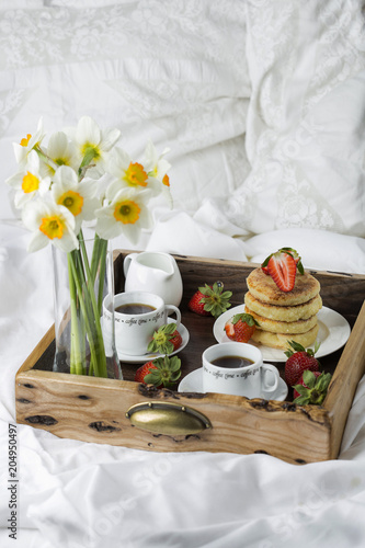 Breakfast in bed  cottage cheese pancakes  coffee and strawberries