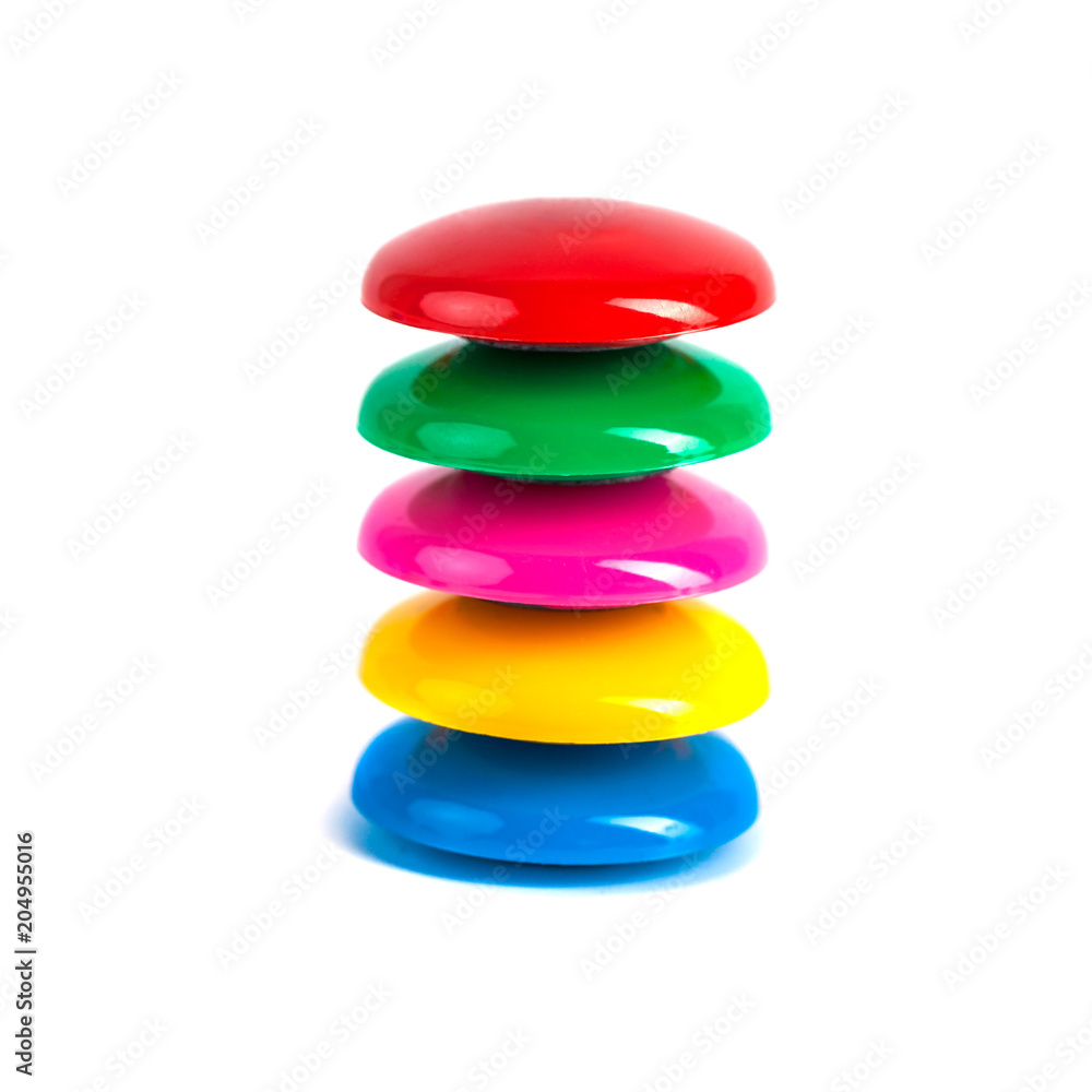 Colorful magnets - holders on a white background Colorful magnets - holders on a white background