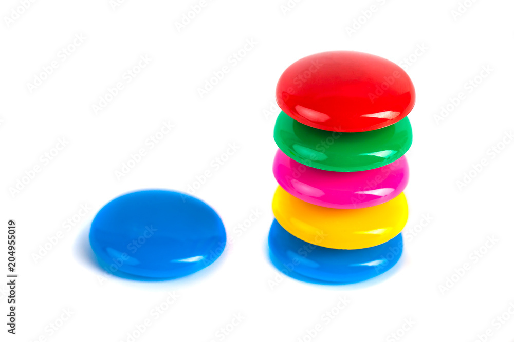 Colorful magnets - holders on a white background Colorful magnets - holders on a white background