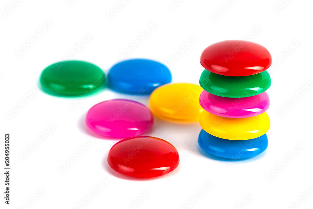 Colorful magnets - holders on a white background