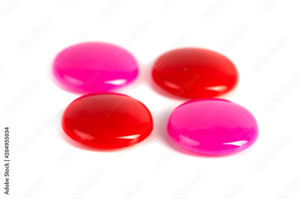 Colorful magnets - holders on a white background Colorful magnets - holders on a white background
