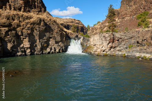 Waterfall at White River in canyon in Eastern Oregon USA Pacific Northwest.