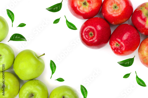 red and green apples decorated with green leaves isolated on white background with copy space for your text, top view