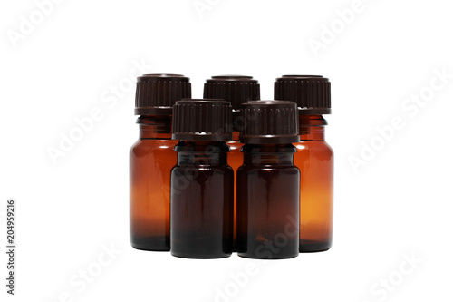 five bottles of aromatherapy oils isolated