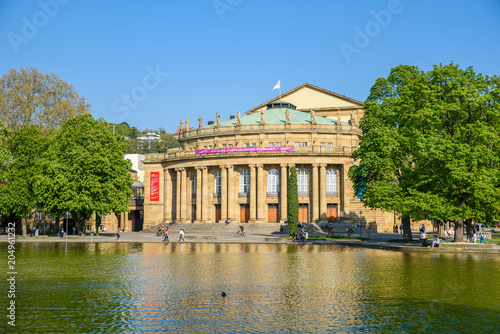 Stuttgart State Theatre Opera building and fountain in Eckensee lake  Germany
