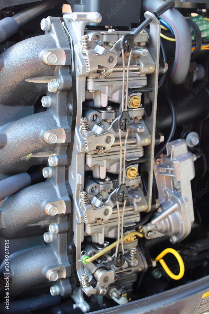Four carburetors outboard motor