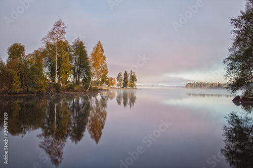 foggy morning in autumn near by the lake Lersjön / Filipstad/ Sweden