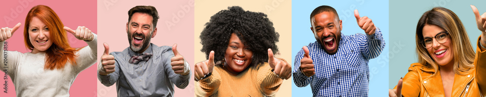 Cool group of people, woman and man stand happy and positive with thumbs up approving with a big smile expressing okay gesture - obrazy, fototapety, plakaty 