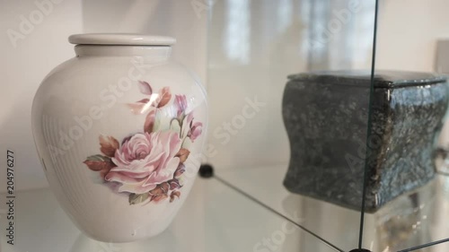 Close up, cremation urn in funeral home