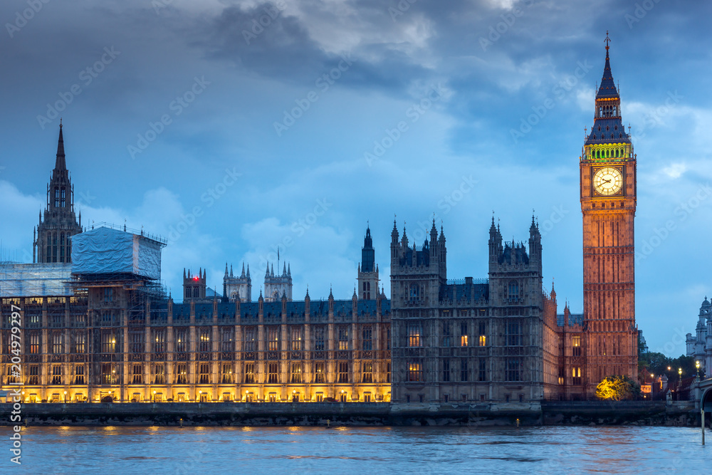 Night photo of Houses of Parliament with Big Ben from Westminster bridge, London, England, Great Britain