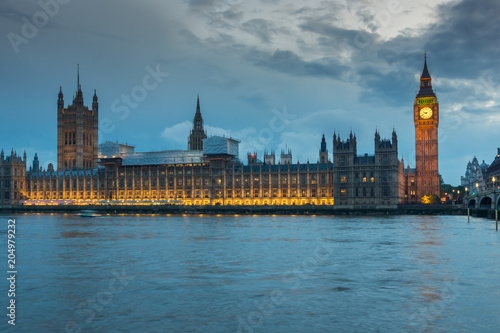 Night photo of Houses of Parliament with Big Ben from Westminster bridge, London, England, Great Britain