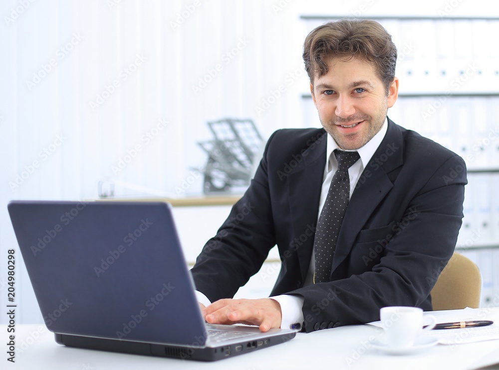 closeup of a senior Manager sitting at Desk closeup of a senior Manager sitting at Desk