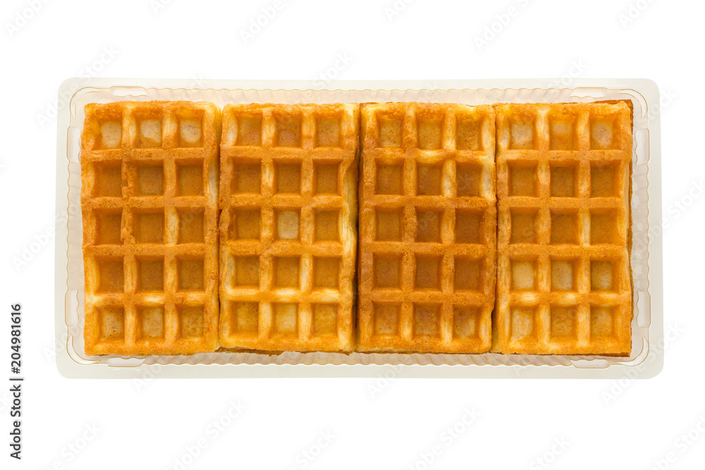 Soft waffles with a filling. A few wafers with a cream filling in a plastic container from the store. Soft waffles with a filling. A few wafers with a cream filling in a plastic container from the store.