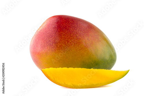 Fresh mango on white background. A mango fruit and a lobule isolated on white background.