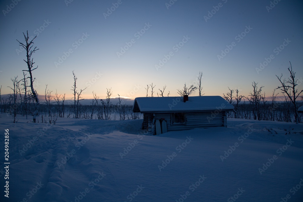wilderness hut on a skiing route in lappland wilderness hut on a skiing route in lappland