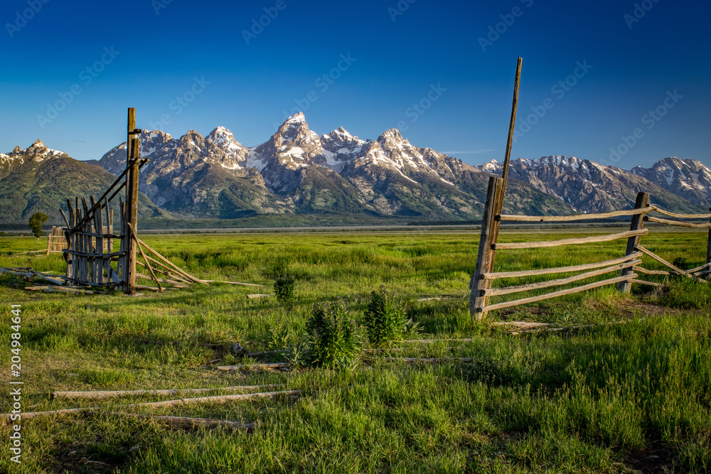 GATEWAY OF OLD FENCE AND GRAND TETONS MORMON ROW WYOMING GATEWAY OF OLD FENCE AND GRAND TETONS MORMON ROW WYOMING
