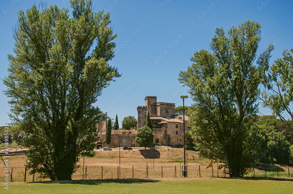 Panoramic view of Lourmarin Castle on top of a hill, near the village of the same name. Located in the Vaucluse department, Provence-Alpes-Côte d'Azur region, southeastern France