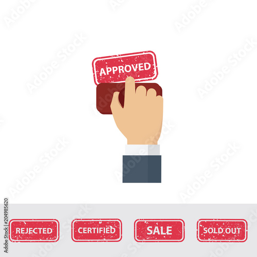 Hand holding rubber stamp. Notary stamping approved word on a paper