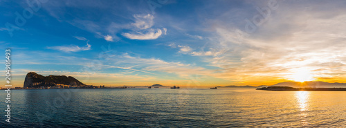 Amazing panoramic view on the rock of Gibraltar during sunset and the ships around it. photo