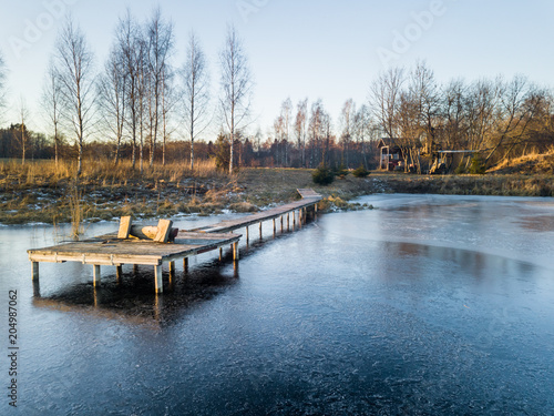 Photo of a Frozen Lake in an Autumn Day © Reinholds