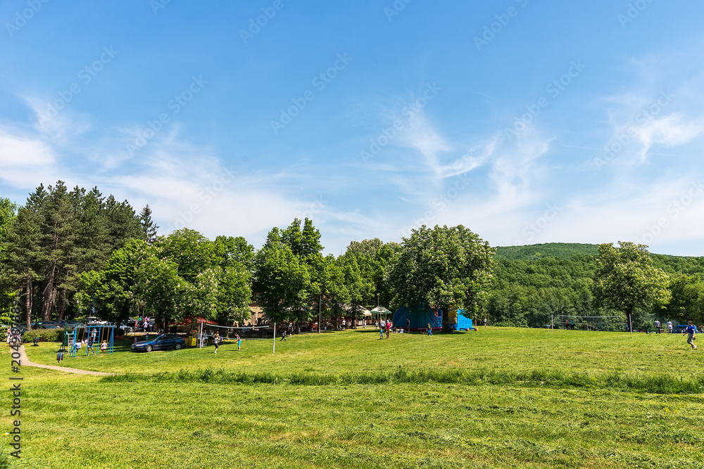 Fototapeta premium Fruska Gora, Serbia May 01, 2018: International Labor Day. People celebrate the holiday in the forest. This is located for Fruska Gora and Andrevlje.