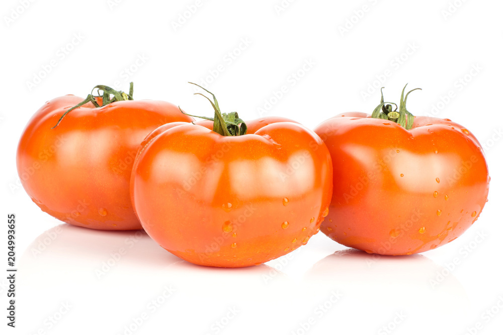 Three red tomato stack with vine ends isolated on white background fresh whole. Three red tomato stack with vine ends isolated on white background fresh whole.