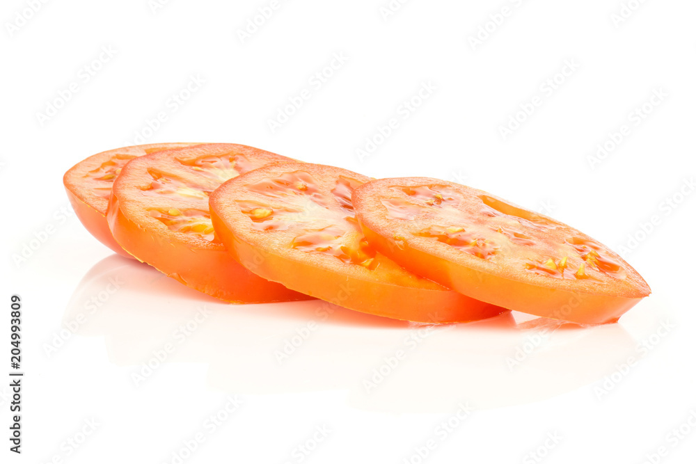 Sliced red tomato four circle slices isolated on white background. Sliced red tomato four circle slices isolated on white background.