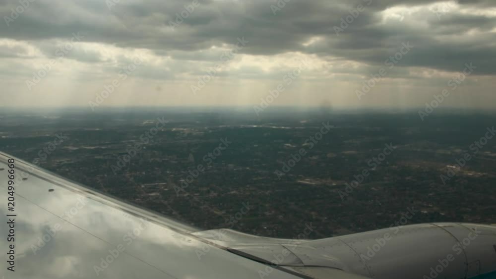 Airplane in flight through clouds Airplane in flight through clouds