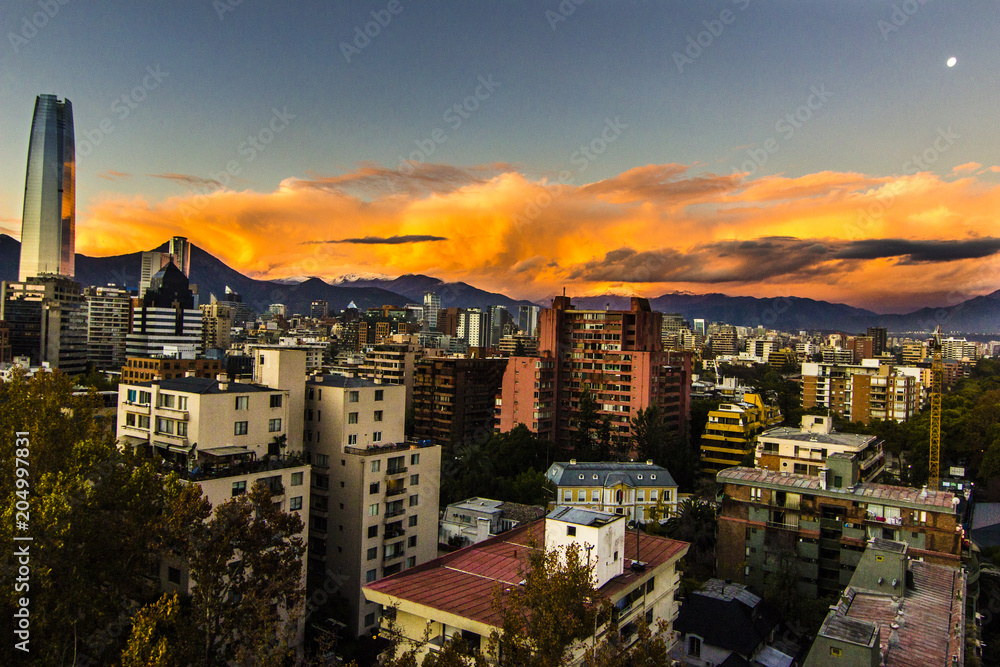 Naklejka premium Sunset over Santiago de Chile city, an amazing and colorful skyline