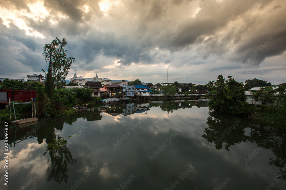 Morning Sky (Niramon Bridge), waterfront community. Chanthaburi Province, Thailand Morning Sky (Niramon Bridge), waterfront community. Chanthaburi Province, Thailand