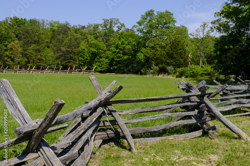 Farm field and stacked wooden fence in Virginia