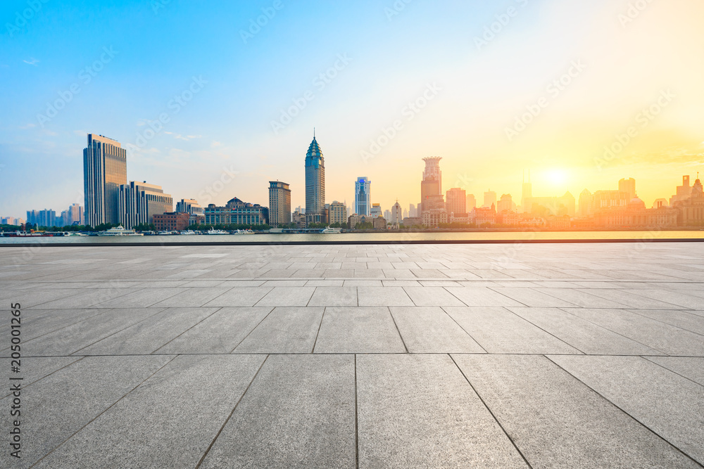 shanghai historic building at sunset on huangpu river and empty square floor