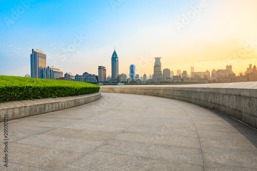 shanghai historic building at sunset on huangpu river and empty square floor