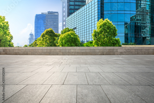 empty square floor and modern commercial office buildings in shanghai