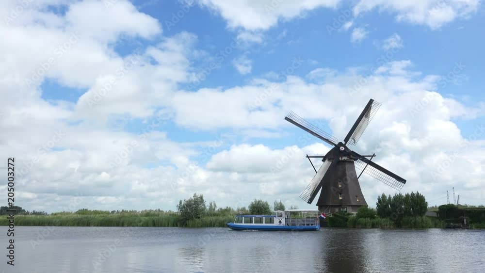 4K Timelapse of Ancient Windmills near the River at Netherlands Landscape 4K Timelapse of Ancient Windmills near the River at Netherlands Landscape