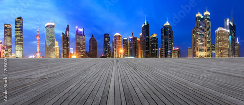 Obraz na plátně empty boardwalk square floor and city skyline scene in shanghai