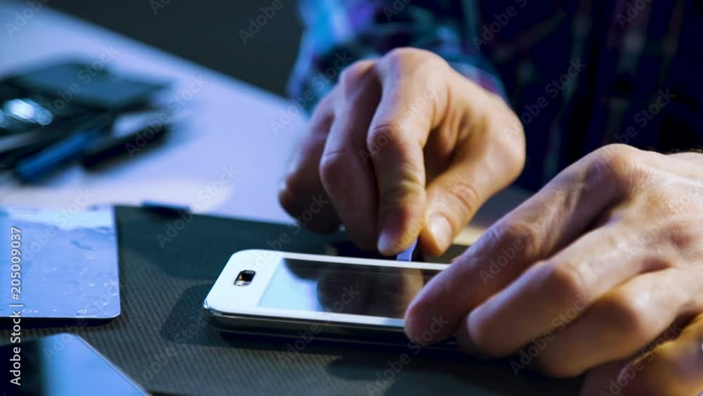 phone service repair. technology gadget maintenance. engineer disassembling smartphone for diagnostics phone service repair. technology gadget maintenance. engineer disassembling smartphone for diagnostics