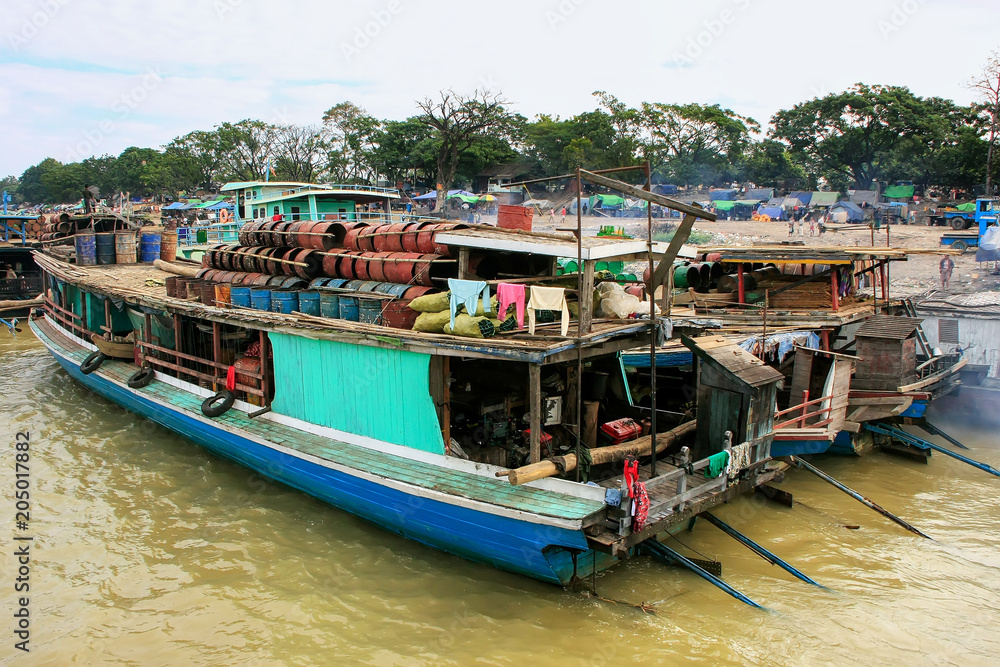 Barges anchored at Ayeyarwady river port in Mandalay, Myanmar