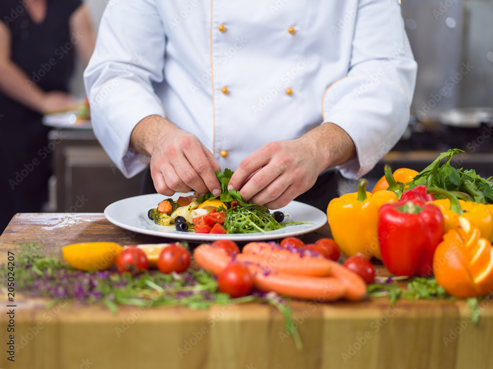 cook chef decorating garnishing prepared meal