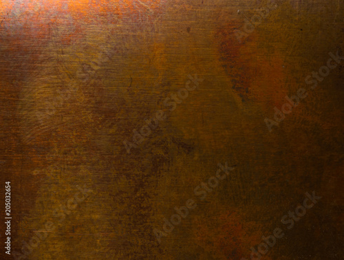 Aged copper plate texture, old worn metal background.